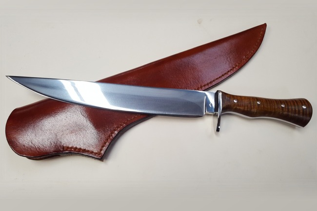 View more about Hand Forged Long Camp Knife with Tiger Maple Handle